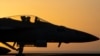 A fighter jet maneuvers on the deck of the USS Dwight D. Eisenhower in the Red Sea, June 11, 2024. 