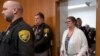 Jennifer Crumbley walks into an Oakland County courtroom before being found guilty on four counts of involuntary manslaughter on Feb. 6, 2024 in Pontiac, Michigan. (Mandi Wright/Detroit Free Press via AP/Pool)
