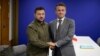 FILE - Ukraine's President Volodymyr Zelenskyy and French President Emmanuel Macron pose for a picture during a meeting on the sidelines of the European Political Community Summit in Granada, Spain Oct. 5, 2023.
