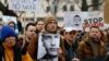 A man holds a photo of Alexey Navalny at a rally on Feb. 18, 2024, in front of the Russian embassy in Berlin, Germany, following news of the death of the Kremlin's most prominent critic in an Arctic prison. 