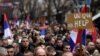 Kosovo Serbs gather as they take part in a protest to oppose the decision by the Central Bank of Kosovo that announced the euro as the only legal currency that can be used in cash operations, in Mitrovica, Feb. 12, 2024.