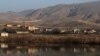 FILE - Mountains and a village are seen in the Erzincan province of Turkey, Feb. 7, 2018. A landslide on Feb. 13, 2024, at a gold mine in the province has trapped at least nine workers underground.