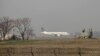 FILE - A Pakistan International Airlines passenger plane prepares to take off from the Benazir International airport in Islamabad, Feb. 9, 2016. The International Air Transport Association warned that foreign airlines could stop operating in Pakistan because of payment issues.