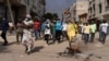 Demonstrators protest President Macky Sall's decision to postpone the Feb. 25 presidential election, in Dakar, Senegal, Feb. 9, 2024.