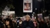 Demonstrators gather to protest Prime Minister Benjamin Netanyahu's reported decision to recall Israeli representatives from cease-fire negotiations, in Jerusalem, Feb. 14, 2024. 