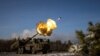 FILE - A Swedish-made Archer self-propelled howitzer of Ukraine’s 45th separate artillery brigade fires at Russian positions in the Donetsk region, Dec. 16, 2023.