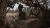 Ukrainian soldiers prepare a self-propelled artillery vehicle to fire at Russian positions on the front line in the Donetsk region, Ukraine, Feb. 16, 2024. 