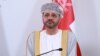 FILE - Omani Foreign Minister Sayyid Badr al-Busaidi listens during a press conference in Muscat, Oct. 10, 2023.