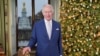 FILE - Britain's King Charles poses for a photo during the recording of his Christmas message at Buckingham Palace, in London, Dec. 7, 2023. 