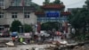北京门头沟区遭洪水袭击道路被毁。（2023年7月31日）