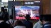 A news program airs a file image of a missile launch by North Korea at the Seoul Railway Station on April 2, 2024. South Korea's military says North Korea fired at least one ballistic missile toward waters off its eastern coast.