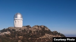 The Nicholas U. Mayall Telescope is located at Kitt Peak National Observatory in Arizona. The telescope currently hosts the Dark Energy Spectroscopic Instrument, the most powerful multi-object survey spectrograph in the world. (NOIRLab)