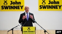 Member of the Scottish National Party (SNP) John Swinney delivers a speech to announce his intentions of running for the SNP leadership as well as his candidacy for the Scotland's first minister position, during a press event in Edinburgh, May 2, 2024.
