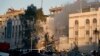 Emergency services work at a destroyed building hit by an airstrike in Damascus, Syria, April 1, 2024. The airstrike, widely attributed to Israel, destroyed the consular section of Iran's embassy in Damascus, killing 12 people. 