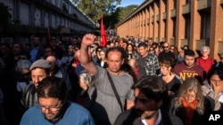 People attend the burial service of Amelia Sanjurjo at La Teja cemetery in Montevideo, Uruguay, June 6, 2024.