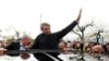 FILE - Brazil's former President Jair Bolsonaro greets supporters at Salgado Filho International Airport, as he arrives in Porto Alegre, Rio Grande do Sul, Brazil, June 22, 2023.