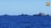 This handout photo from the Armed Forces of the Philippines, released on Apr. 7, 2024, shows ships participating in the first Multilateral Maritime Cooperative Activity between the Philippines, US, Australia and Japan, in South China Sea.