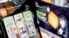 FILE - This photo illustration shows the Temu app in the App Store reflected in videos of Temu consumers, in Washington, on February 23, 2023.