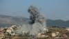 FILE - Smoke billows from the site of an Israeli airstrike on the southern Lebanese village of Khiam on June 8, 2024, as fighting continues between Israel and Hamas militants in the Gaza Strip.