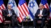 U.S. President Joe Biden, left, and Israeli Prime Minister Benjamin Netanyahu are pictured during their meeting in Tel Aviv, Israel, Oct. 18, 2023.