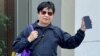 李解新被指街头演奏《愿荣光归香港》，被法庭裁定7项无牌演奏等传票控罪成立，判监30日，获准保释等候上诉 (美国之音/汤惠芸)