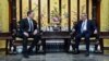 In this photo released by Xinhua News Agency, visiting Tesla founder and CEO Elon Musk, left, meets with Chinese Premier Li Qiang in Beijing, April 28, 2024. (Wang Ye/Xinhua via AP)