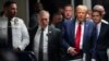 FILE - Donald Trump leaves Manhattan criminal court, Feb. 15, 2024. The president-elect has sought to have a civil judgment against him for fraud set aside.