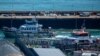People believed to be migrants, disembark from a British Border Force vessel as they arrive at the Port of Dover in Dover, Britain, April 29, 2024.