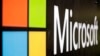 FILE - Microsoft logo is displayed at their offices in Sydney, Australia, Feb. 3, 2021. 