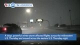 VOA60 America- Powerful winter storm causes flight cancellations, heavy snow, dangerous cold to much of the eastern U.S.