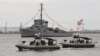 A Philippine Navy special operations group on board speed boats patrols off Subic Bay, facing the South China Sea, August 6, 2013.