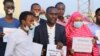 FILE - Somali journalists protest in support of an imprisoned colleague. (Twitter @sjs_Somalia)