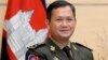 រូបឯកសារ៖ ​លោក​ឧត្តមសេនីយ៍ឯក​ ហ៊ុន​ ម៉ាណែត​​​​ មេ​បញ្ជា​ការ​កង​ទ័ព​ជើង​គោក​កម្ពុជា និង​ជា​កូនប្រុស​ច្បង​របស់​លោក​នាយករដ្ឋមន្ត្រី ហ៊ុន សែន ឈរ​ថតរូប​នៅ​មុន​ជំនួប​របស់​លោក​ជាមួយ​នឹង​សមភាគី​ជប៉ុន​នៅ​ទីក្រុង​តូក្យូ ប្រទេស​ជប៉ុន ថ្ងៃទី ១៦ ​ខែកុម្ភៈ ឆ្នាំ២០២២។ 