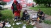 Paramedics and emergency workers provide medical care to the wounded as a result of shelling in Kharkiv, Ukraine, May 26, 2022.