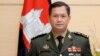រូបឯកសារ៖ ​លោក​ឧត្តមសេនីយ៍ឯក​ ហ៊ុន​ ម៉ាណែត​​​​ មេ​បញ្ជា​ការ​កង​ទ័ព​ជើង​គោក​កម្ពុជា និង​ជា​កូនប្រុស​ច្បង​របស់​លោក​នាយករដ្ឋមន្ត្រី ហ៊ុន សែន ឈរ​ថតរូប​នៅ​មុន​ជំនួប​របស់​លោក​ជាមួយ​នឹង​សមភាគី​ជប៉ុន​នៅ​ទីក្រុង​តូក្យូ ប្រទេស​ជប៉ុន ថ្ងៃទី ១៦ ​ខែកុម្ភៈ ឆ្នាំ២០២២។ (