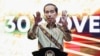 Presiden Joko Widodo saat menyampaikan sambutan pada pertemuan tahunan bank sentral Indonesia dengan para pemangku kepentingan keuangan di Jakarta, 30 November 2022. REUTERS/Willy Kurniawan
