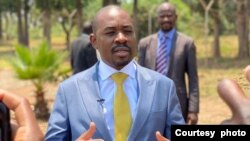 Nelson Chamisa speaking to reporters outside Chikurubi Maximum Security Prison