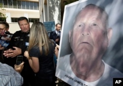 Sacramento County Sheriff Scott Jones, left, talks to reporters about the arrest Joseph James DeAngelo, seen in photo, on suspicion of committing a string of violent crimes in the 1970s and 1980s after a news conference, April 25, 2018, in Sacramento, Cal