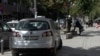 Northern Mitrovica, Kosovo -- Illegal Serbian acronym plates on a car in Kosovo