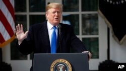 President Donald Trump speaks during an event in the Rose Garden at the White House to declare a national emergency in order to build a wall along the southern border, Feb. 15, 2019, in Washington.