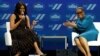 U.S. first lady Michelle Obama and television presenter Oprah Winfrey participate in the White House's "United State of Women" summit in Washington, June 14, 2016.