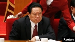 FILE - China's then Public Security Minister Zhou Yongkang attends the opening ceremony of the 17th National Congress of the Communist Party of China at the Great Hall of the People in Beijing.