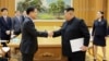 Shugaba Kim Jong-Un da wani jami'i