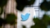 FILE - A sign at Twitter headquarters is shown in San Francisco, Dec. 8, 2022. 
