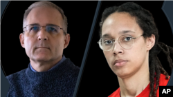 FILE - Americans Paul Whelan and Brittney Griner, both detained in Russia, are seen in a combination photo. 