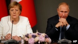 Анґела Меркель з Володимиром Путіним 27 жовтня 2018 р.