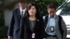 FILE - North Korean Vice Foreign Minister Choe Son Hui, center, arrives for a meeting with US Ambassador to the Philippines Sung Kim at the Ritz-Carlton Millenia Hotel in Singapore, June 11, 2018, ahead of the summit between U.S. President Donald Trump an