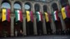 FILE - Mexican and Ecuadoran flags hang at the National Palace in Mexico City, Nov. 24, 2022. Mexican President Andres Manuel Lopez Obrador broke diplomatic ties with Ecuador on April 5, 2024, after Ecuadoran police broke into the Mexican Embassy in Quito.