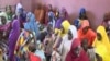 Women and children rescued from their Boko Haram captors are seen in Meri, Cameroon, April 9, 2021. (Moki Edwin Kindzeka/VOA)