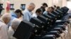 FILE - People cast their ballots in Carson City, Nevada, Nov. 4, 2014. 